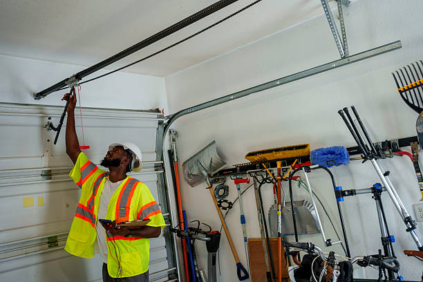 Professional Garage Door Panel Replacement technician working in Kingsford Heights, IN